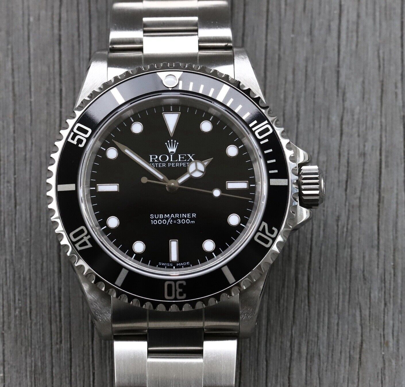 RolexSubmarinerNoDate14060ASerial2Liner-1999WatchVault01_a33c01c2-6e54-464a-8299-c0baadcccaf5.jpg