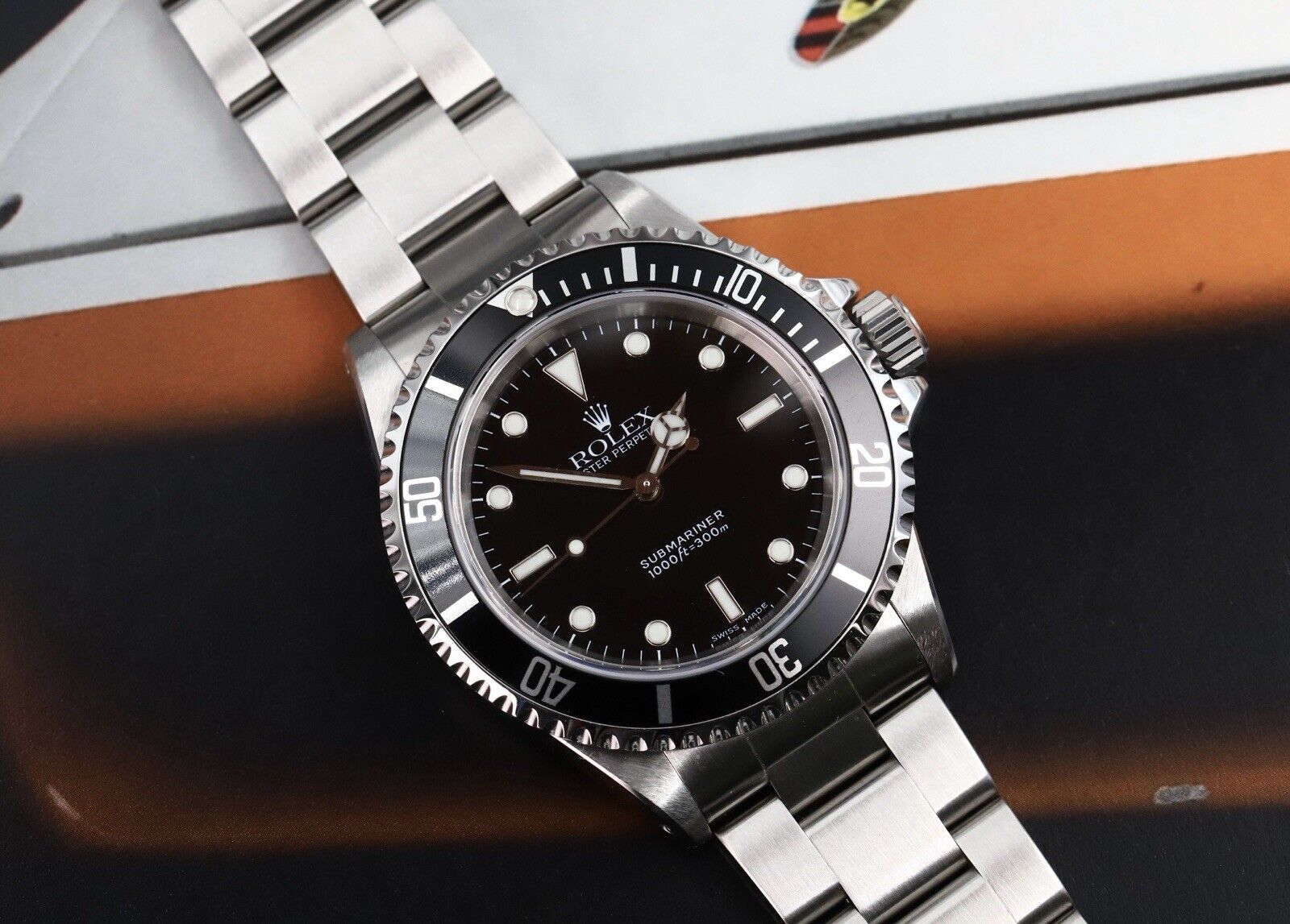 RolexSubmarinerNoDate14060ASerial2Liner-1999WatchVault02_d9c9b5dc-62ea-421b-9517-86fc00829104.jpg