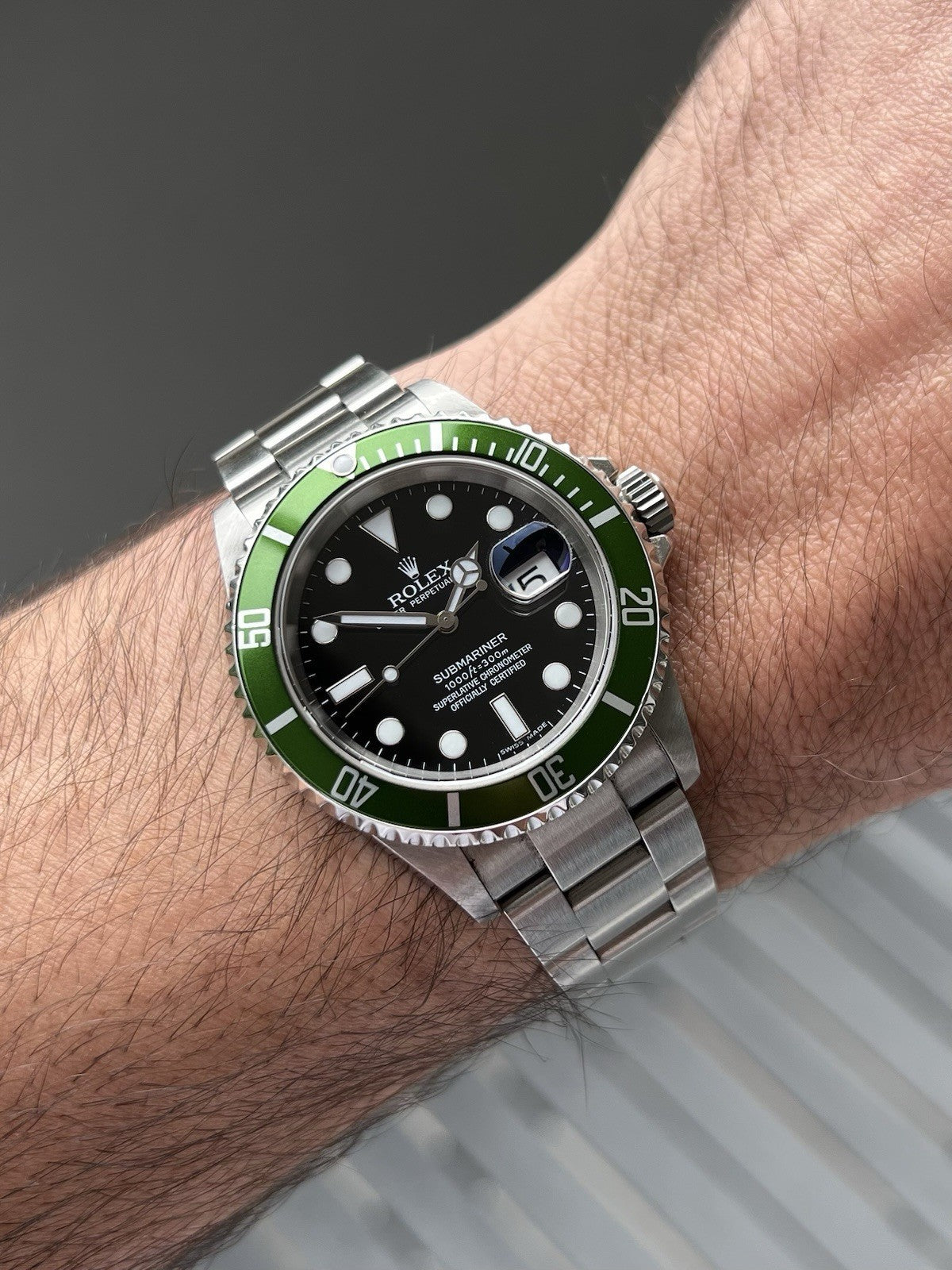 RolexSubmariner_Kermit_DSerial16610LV-2006WatchVault02_14d20f24-48bf-4cc2-9986-045fd81db6bb.jpg